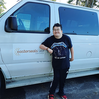 Man smiling with vehicle donation